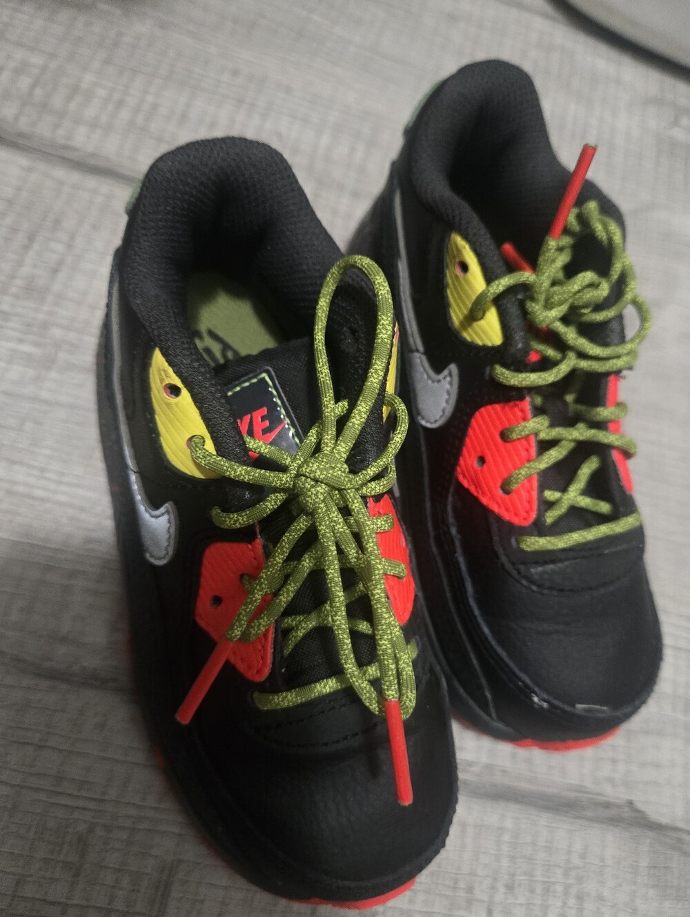 Nike Kids Black Sneakers with Neon Red & Lime Green Accents